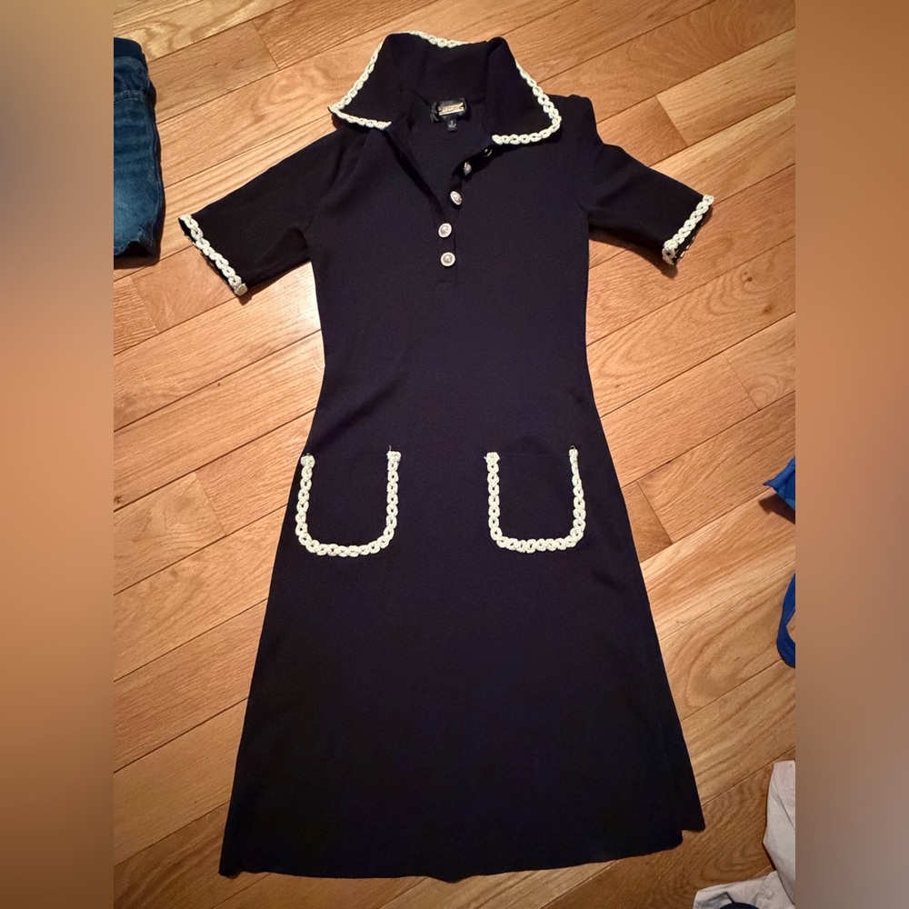 Elegant Black women’s dress with pearls
